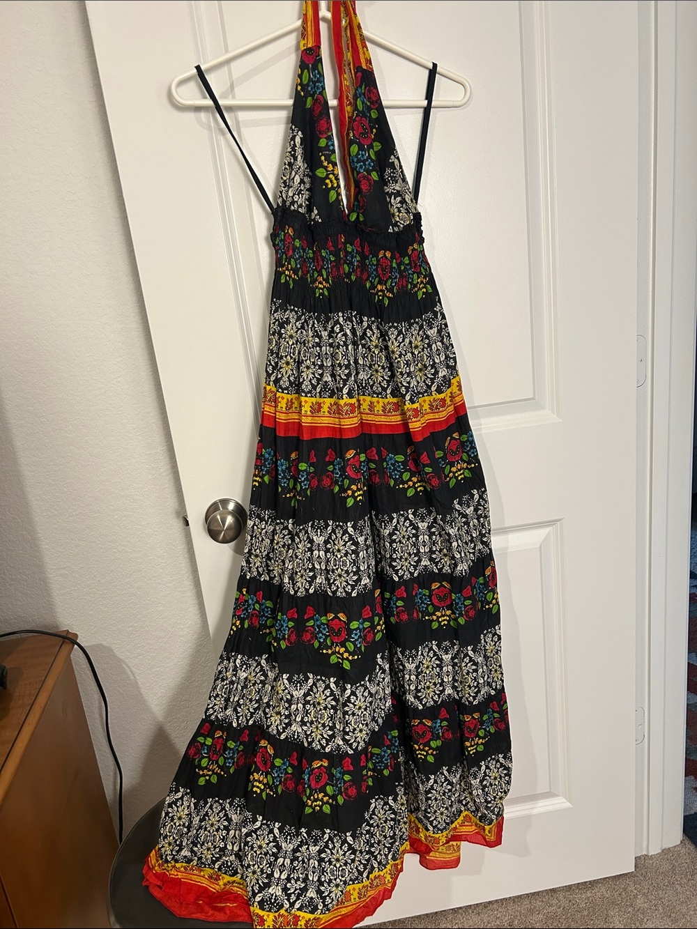 Black Floral Halter Maxi Dress with Red and Yellow Accents